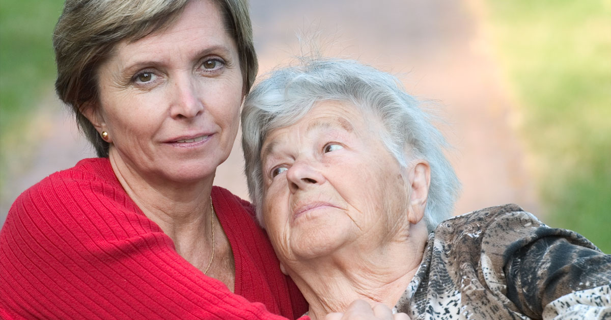 Adult Daughter Caring For Her Aging Mother